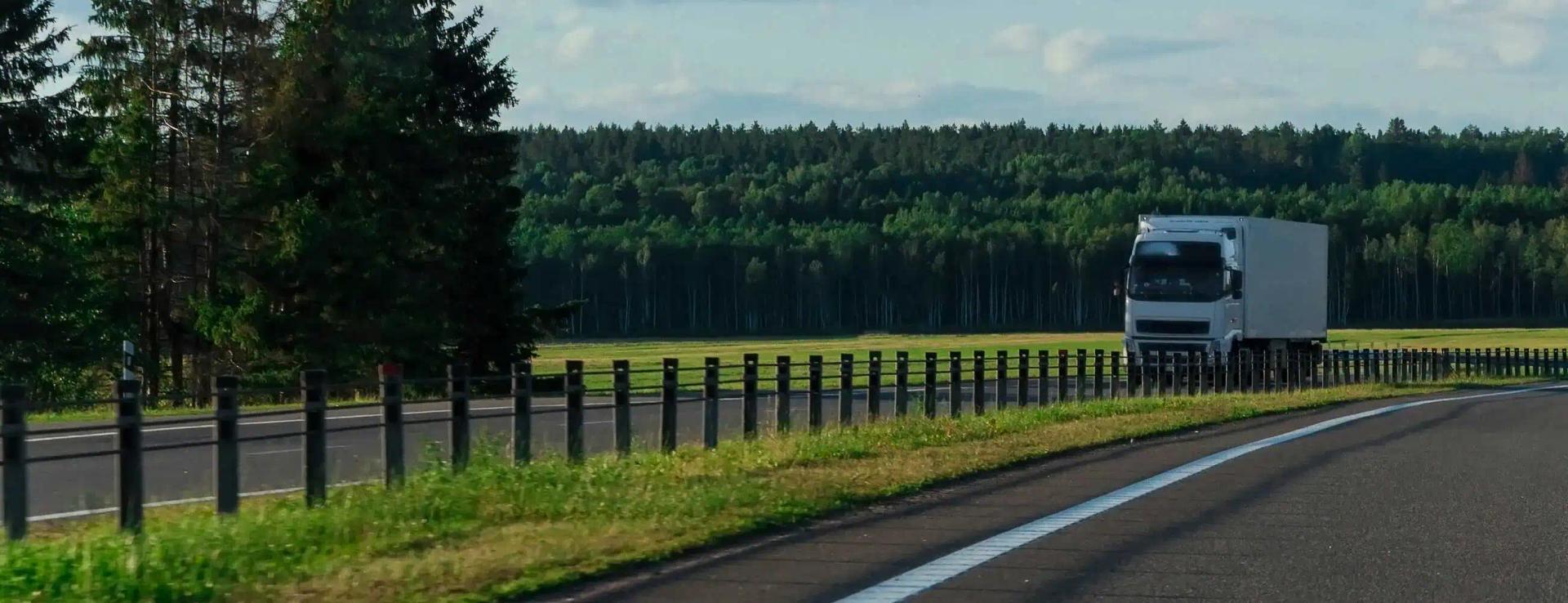 Moving truck driving on a highway during a long-distance move